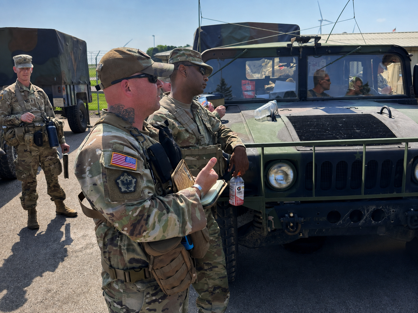 Craig Dutton coaching soldiers during field training